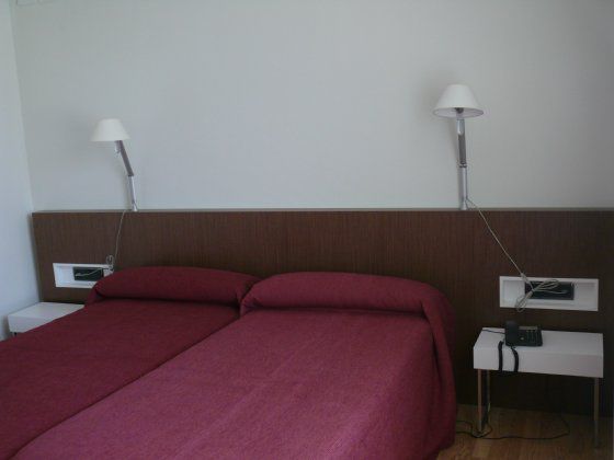 Hotel Los Angeles Guarnizo Szoba fotó